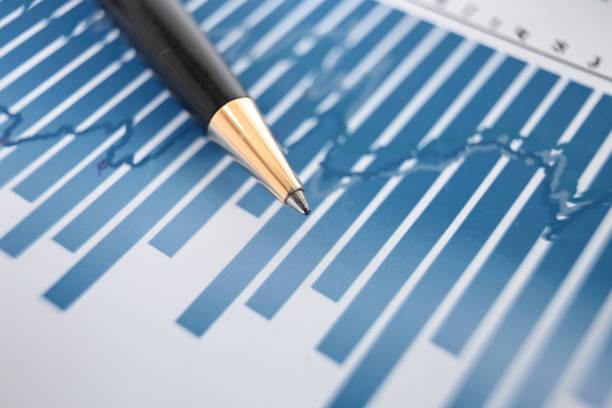 istock close up. ballpoint pen on the desktop 1192897224