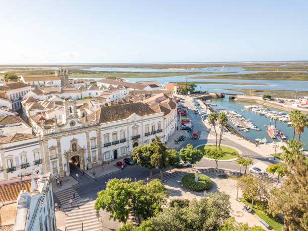 Faro city center by Ria Formosa, Algarve, Portugal City center of Faro, capital city of Algarve, Portugal faro district portugal photos stock pictures, royalty-free photos & images