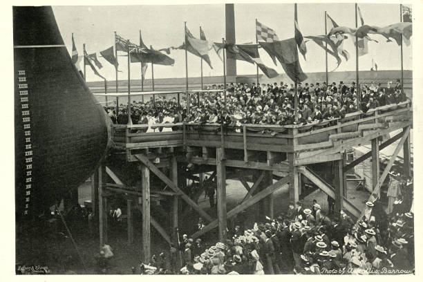 Launch of HMS Powerful, Royal Navy warship, 1895 Vintage photograph of the Launch of HMS Powerful, Royal Navy warship, at Barrow-in-Furness, 1895 cumbria photos stock pictures, royalty-free photos & images
