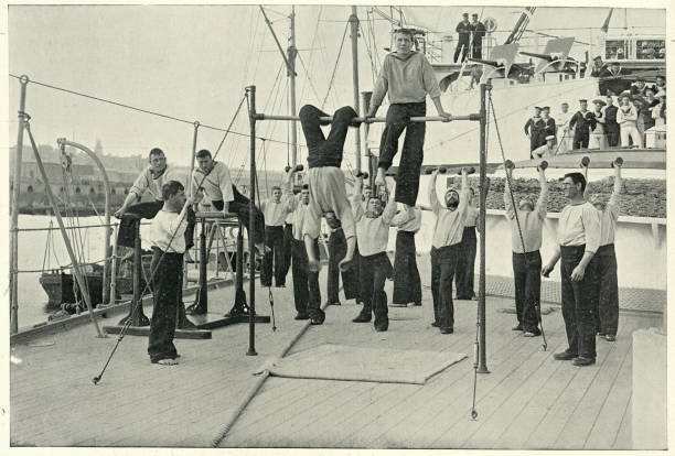 Royal navy gymnastics team, HMS Howe, 19th Century Vintage photograph of Royal navy gymnastics team, HMS Howe, 19th Century gymnastics bar photos stock pictures, royalty-free photos & images