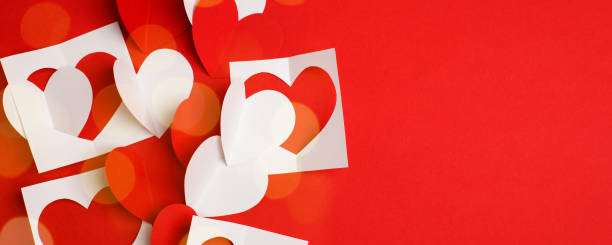 istock Paper craft hearts on a red background. Empty place for copy space for text. mock-up, minimal concept of romance winter february holiday. saint Valentine day, banner 1192900031