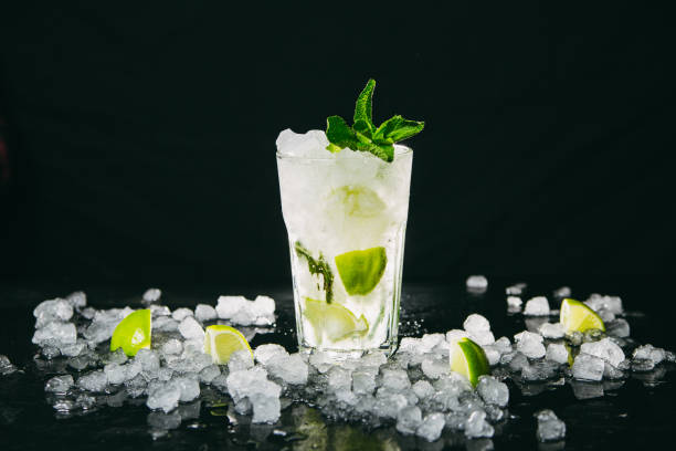 istock Mojito cocktail on black background 1192902188
