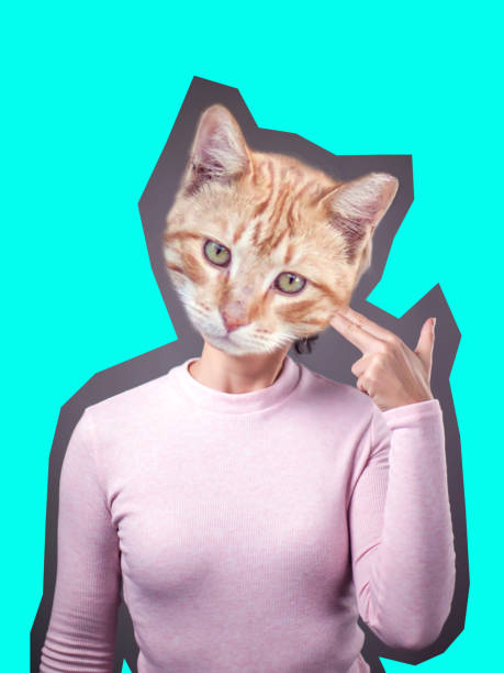 istock Modern art collage. Woman model with cat face instead head on bright background. 1192902696