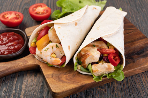 istock burrito with vegetables and tortilla 1192903004