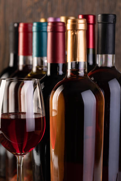 istock Row of vintage wine bottles 1192903128