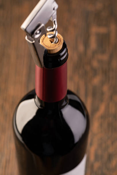 istock Corkscrew and bottle of wine 1192903134
