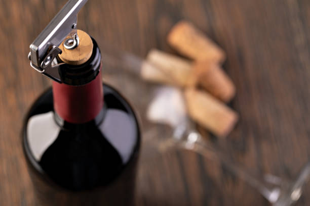 istock Corkscrew and bottle of wine 1192903137