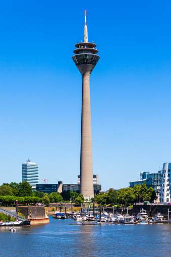 DUSSELDORF, GERMANY - JULY 01, 2018: Rheinturm or Rhine Tower is a 240 metre high concrete telecommunications tower in Dusseldorf city in Germany