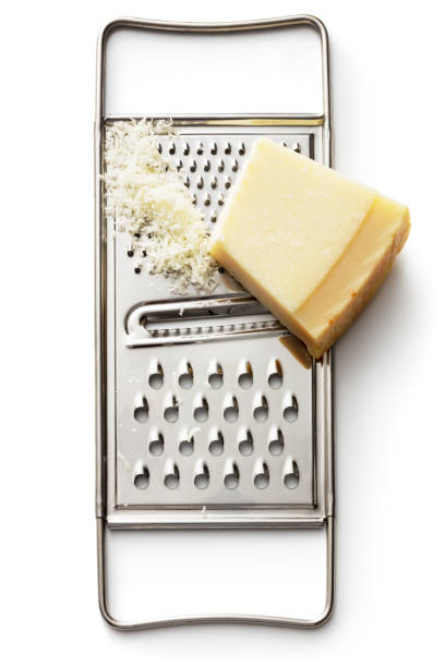 cheese: parmesan and grater isolated on white background - recipe ingredient grater cheese grater imagens e fotografias de stock
