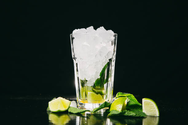 istock Mojito cocktail on black background 1192905440