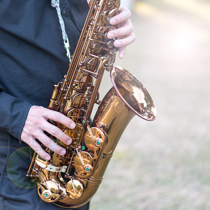 International jazz day and World Jazz festival. Saxophone, music instrument played by saxophonist player musician in fest.