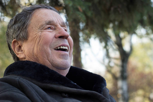 istock Portrait of senior man smiling 1192909313