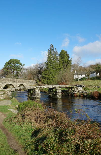 istock Postbridge Dartmoor Devon England, and her two bridges. 1192910026