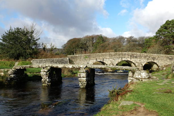 istock Postbridge Dartmoor Devon England, and her two bridges. 1192910029