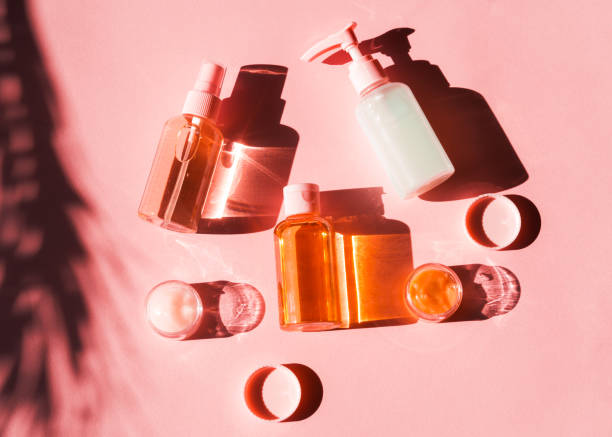 istock Various cosmetic products on pink coral. Flat lay 1192912167