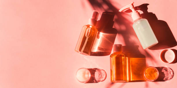 istock Various cosmetic products on pink coral. Flat lay 1192912178
