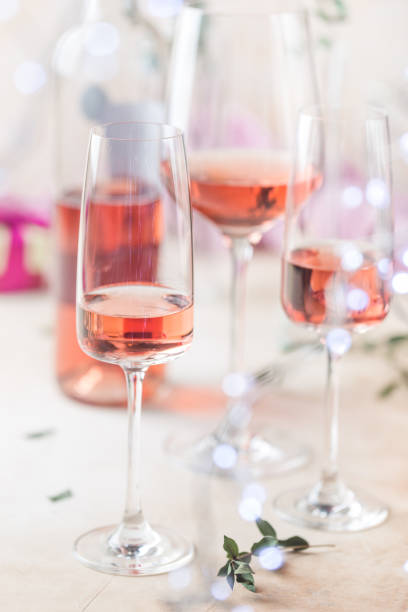 istock Glasses and bottle of rose wine 1192912568