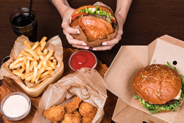 istock Burger on a wooden board 1192912596
