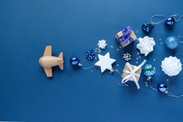 wooden children's plane on a classic blue background