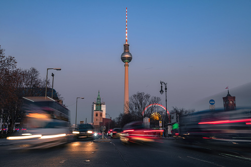 long exposure of cars lights at blue hour in central berlin with TV -Tower