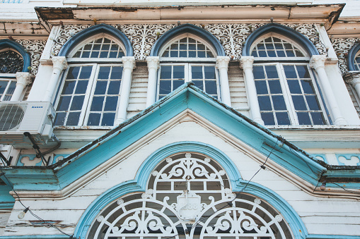 Close-up of a wooden facade of a city hall in Guyana capital, Georgetown