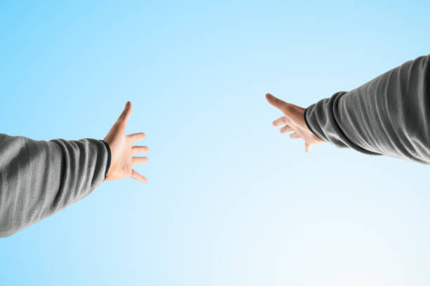 istock Hands raised to the sky. Point of view 1192917972