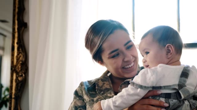 Female soldier is reunited with her baby daughter