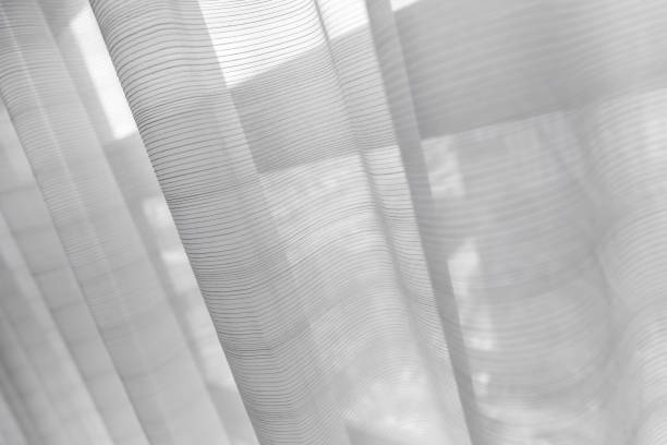 istock Tulle curtain with window behind. Background photo 1192926101