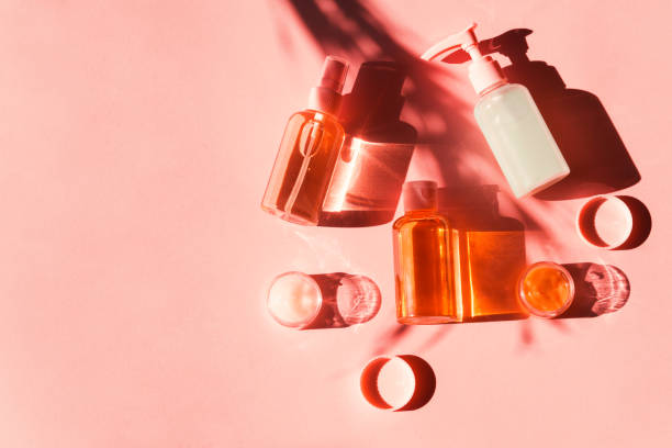 istock Various cosmetic products on pink coral. Flat lay 1192926196