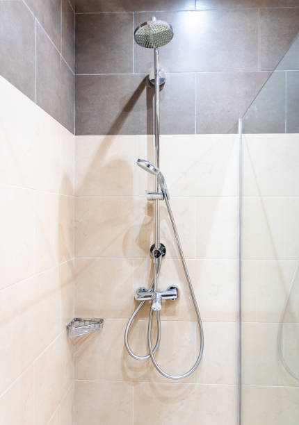 istock Glass shower walk in cabin in modern interior 1192928870