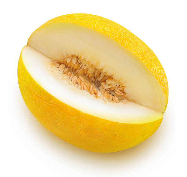 Isolated yellow melon Isolated melon. Yellow melon fruit with cut out slice isolated on white background with clipping path, high angle view honeydew melon stock pictures, royalty-free photos & images