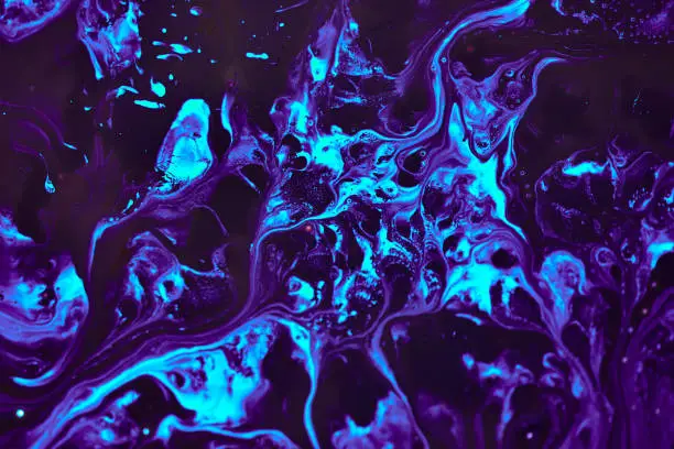 Photo of Abstract liquid violet blue colors outer space background. Exoplanet cosmic sea pattern, paint stains