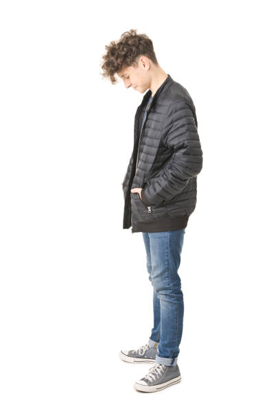 istock 12 years old boy isolated on white - full body picture 1192936251