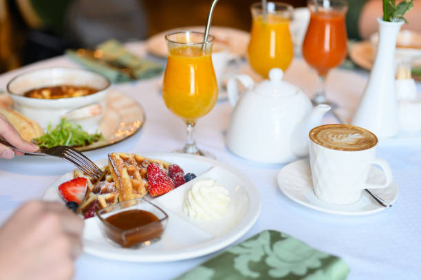 istock morning Breakfast or brunch in the restaurant. table with drinks and food. selective focus 1192936613