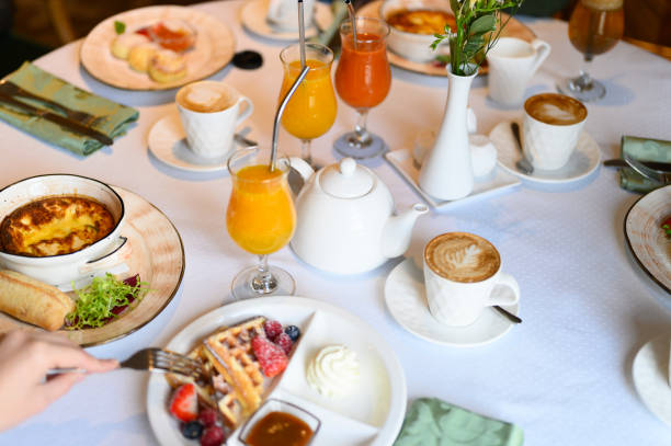istock morning Breakfast or brunch in the restaurant. table with drinks and food. selective focus 1192936615