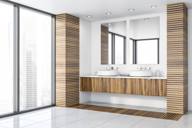 istock Double sink in wooden and white bathroom corner 1192936649