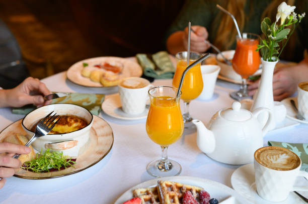 istock morning Breakfast or brunch in the restaurant. table with drinks and food. selective focus 1192936664