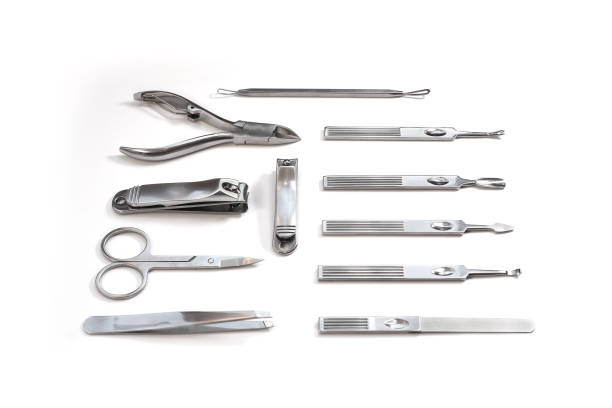 istock Metallic manicure set with black case on an isolated white background. Beauty salon and tools for nails. Women's handbag gift 1192938580
