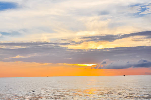 istock Fishing board at horizontal and sunrise with colorful dramatic sky cloud in Khanh Hoa 1192940867