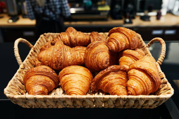 istock puff croissants folded in a wicker basket, pastry bakery, fresh buns 1192941162