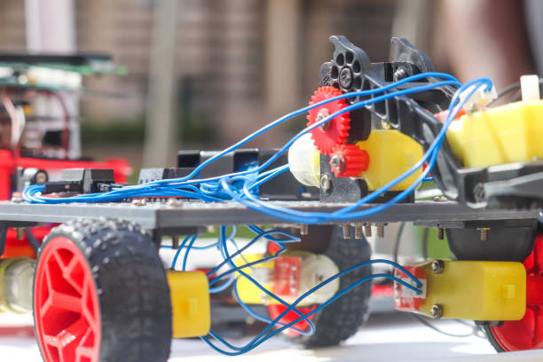 istock Educational Robots Usings Electronic Boards Wires and Plastic Parts Hand Made Technology 1192944437