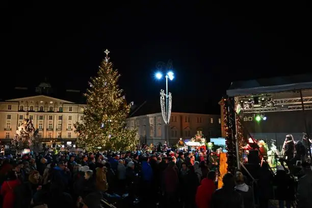 1 December 2019 Brno. Christmas holidays in the center of Brno. Street with shops and Christmas decor with people