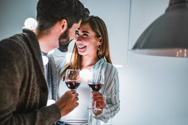 istock Young couple celebrating Valentine's Day indoors 1192945170