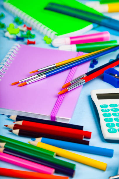 istock Items for the school on a wooden table. 1192946169