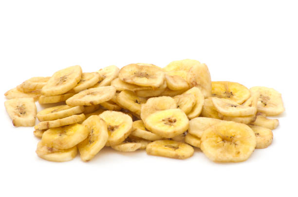 istock a pile of banana chips on white background 1192947208