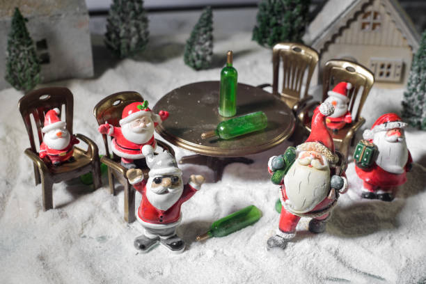 istock Alcoholic Santa Drinking a Wine Bottle. Creative concept 1192948997