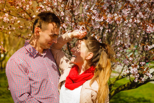 istock Happy couple having romantic date in park 1192949475