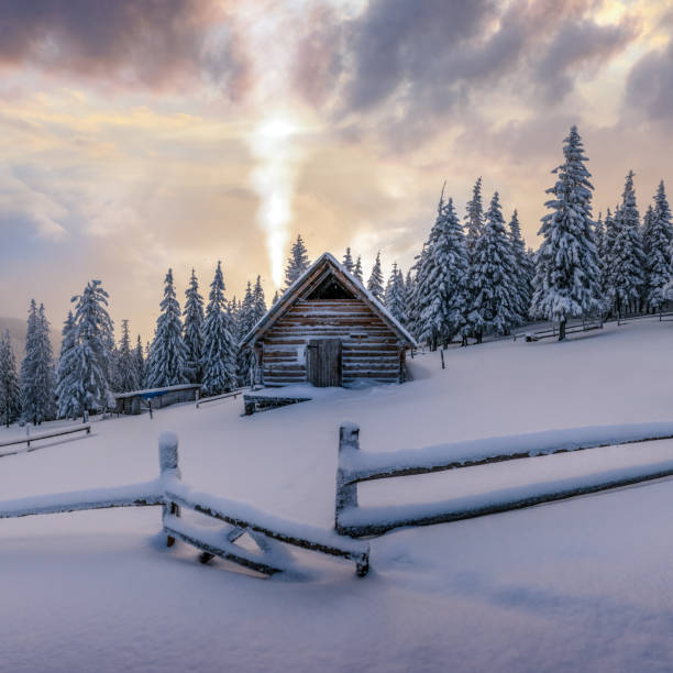 istock Fantastic landscape with snowy house 1192950587
