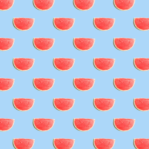 istock Pattern of fresh ripe fruit isolated on light blue texture 1192950771