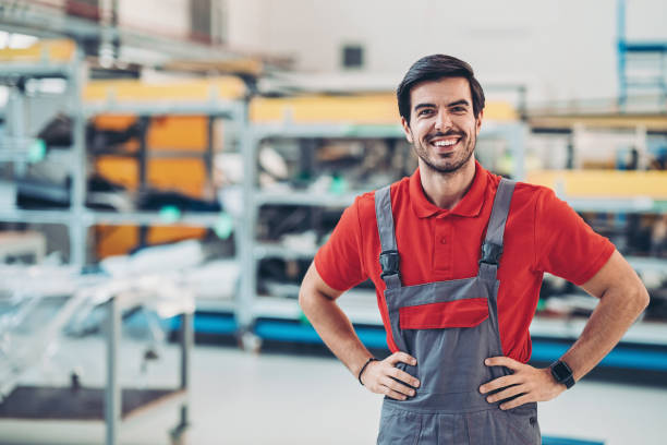 istock Portrait of a smiling engineer in a hangar 1192951244